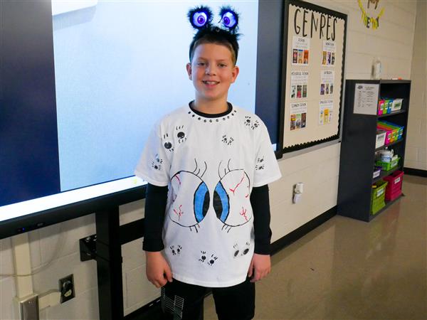 Fifth Graders putting on a Pun Fashion Show.